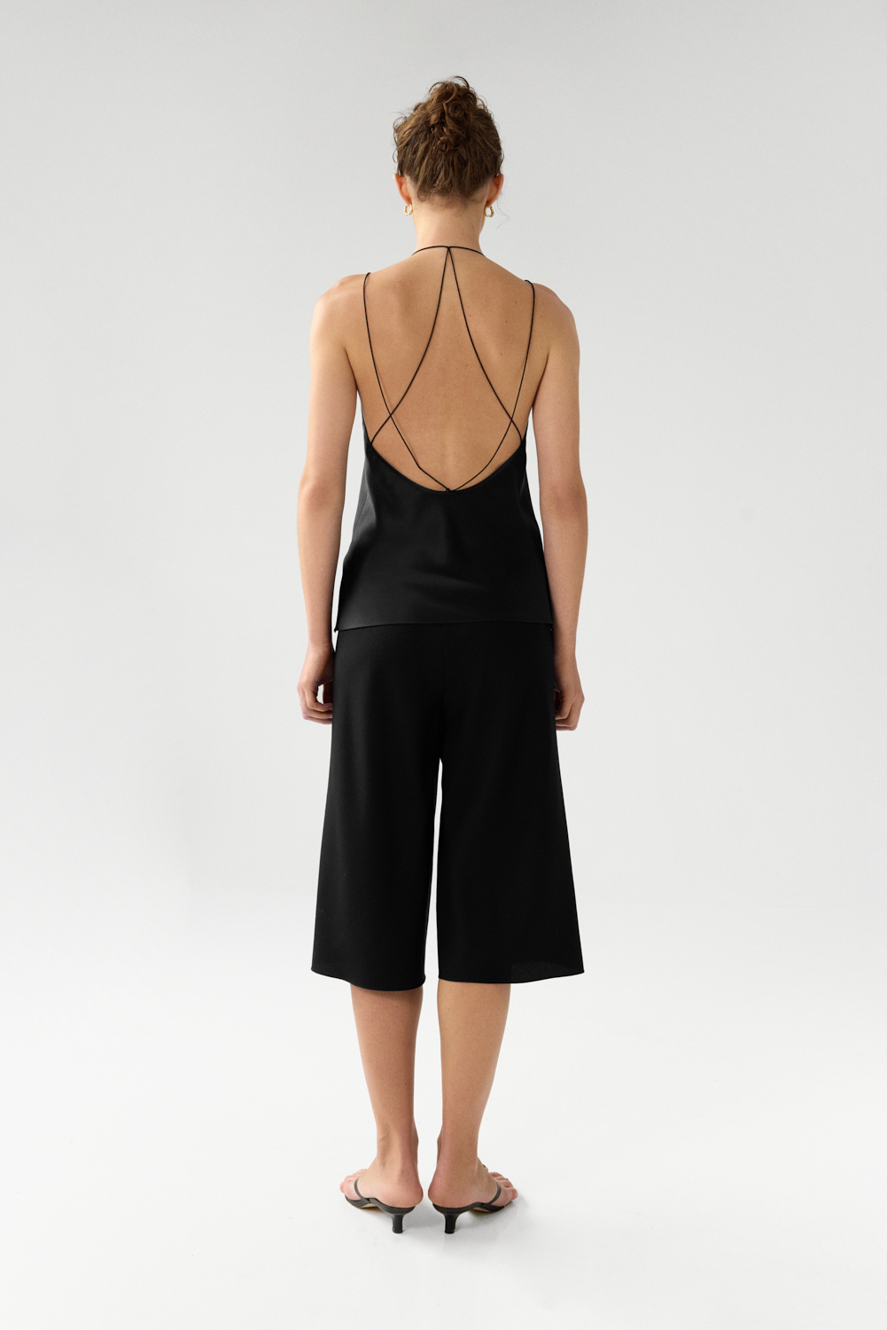 Harlow Black bias cut longline shorts in Silk Cady